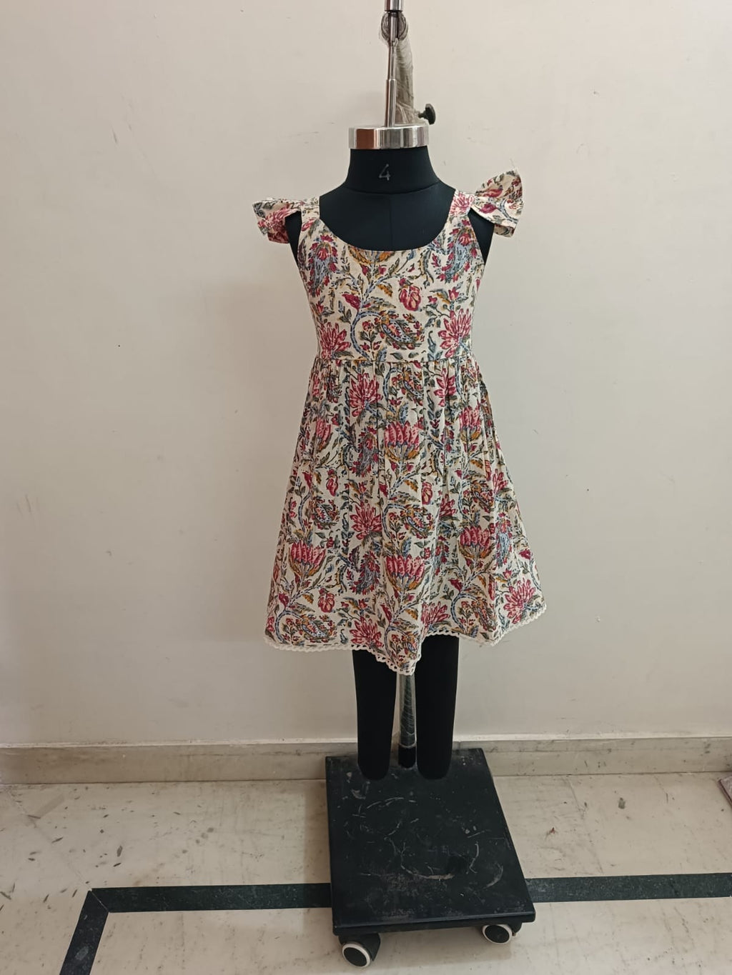 Cream Floral Smocked Back Sleeveless Frock